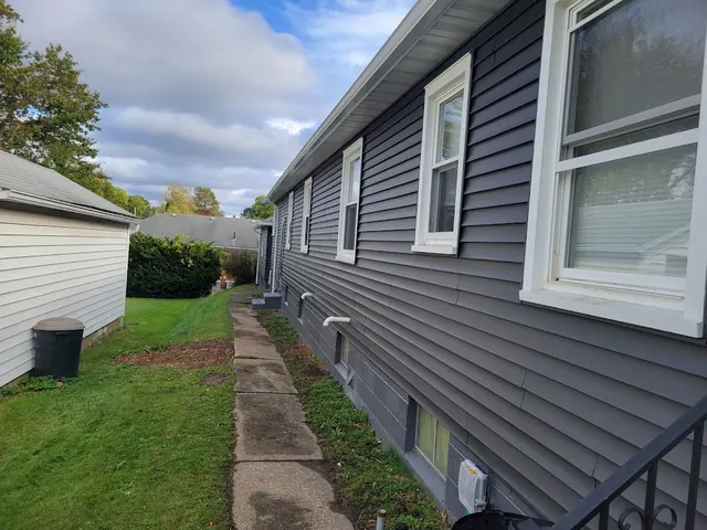 SRS Construction Services - Roofing and Siding Contractor